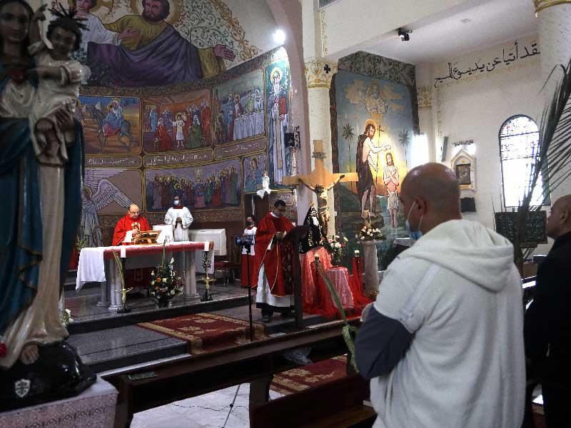 الكنائس الغربية بفلسطين تحتفل بأحد الشعانينn