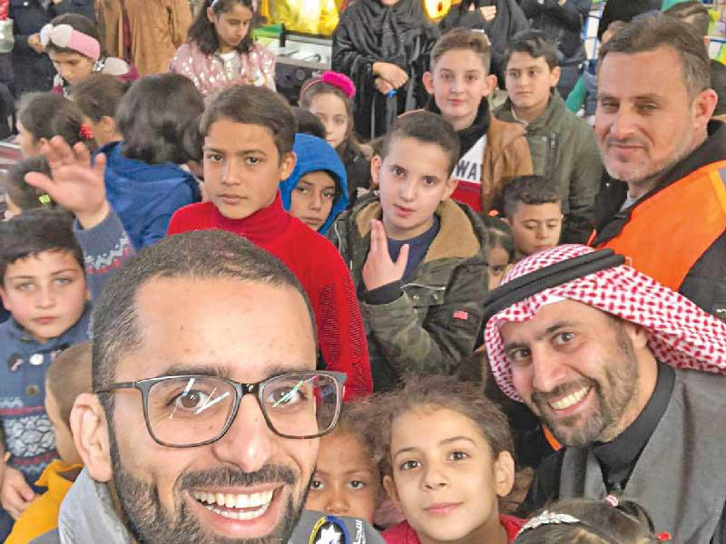 جانب من أحد أنشطة جمعية النجاة مع الأيتام