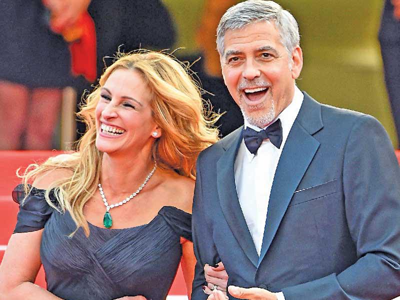 الممثل جورج كلوني والممثلة جوليا روبرتس 