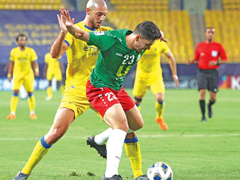 جانب من مباراة النصر السعودي والوحدات الأردني (ا ف ب)