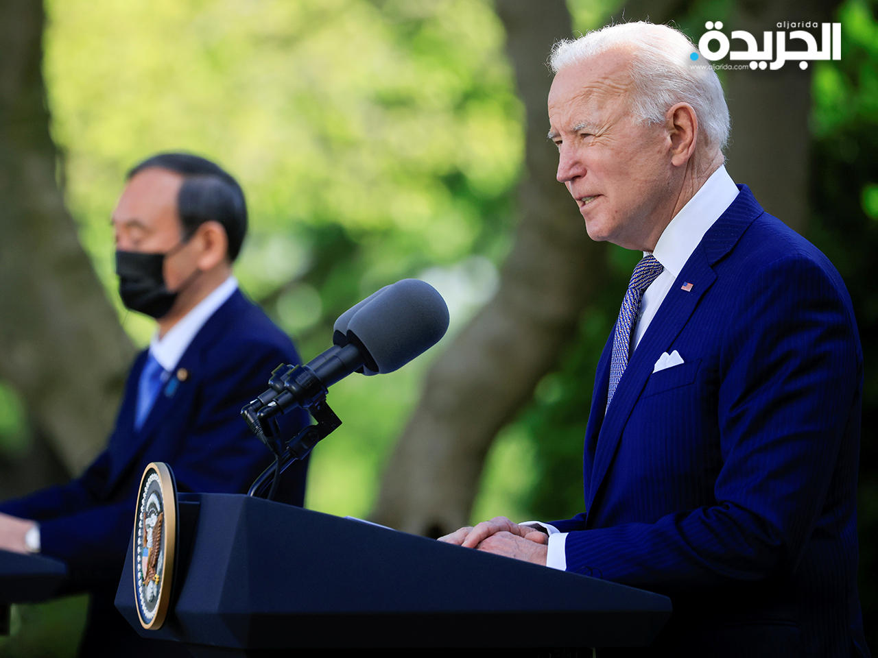 الرئيس الأميركي جو بايدن مع رئيس وزراء ياباني يوشيهيدي سوغا