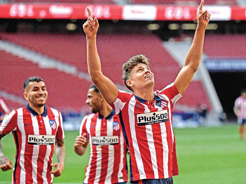 لاعبو أتلتيكو مدريد خلال مباراة سابقة