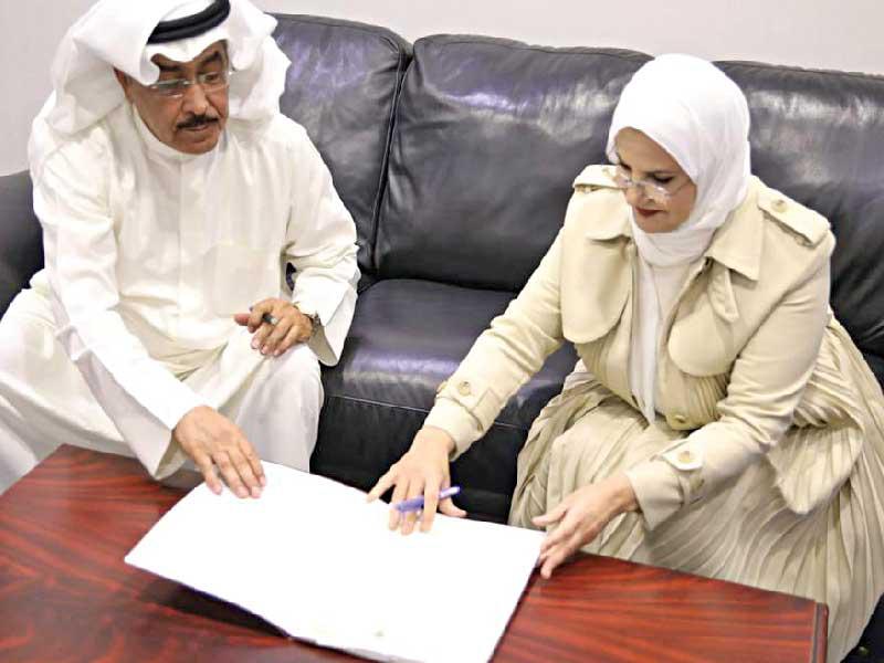 جانب من توقيع اتفاق «الإعلام» و«الصحافيين»