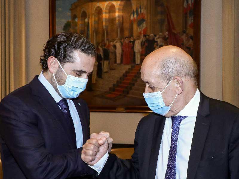 رئيس الوزراء اللبناني المكلف سعد الحريري و وزير الخارجية الفرنسي جان إيف لودريان خلال اجتماعهما في العاصمة بيروت. (صورة ارشيفية)