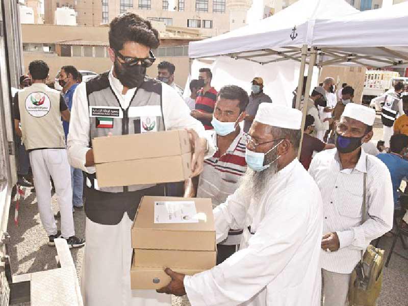 توزيع وجبات الإفطار في رمضان الماضي