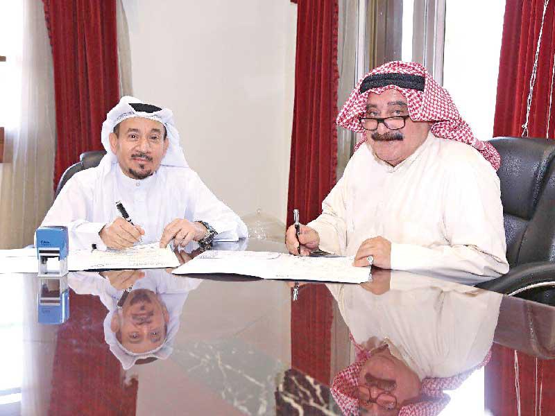  جانب من توقيع البروتوكول