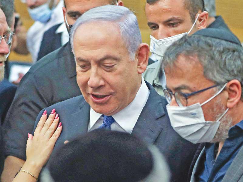 ئيس الحكومة الإسرائيلية بنيامين نتنياهو بعد جلسة انتخاب رئيس جديد في الكنيست أمس (أ ف ب)