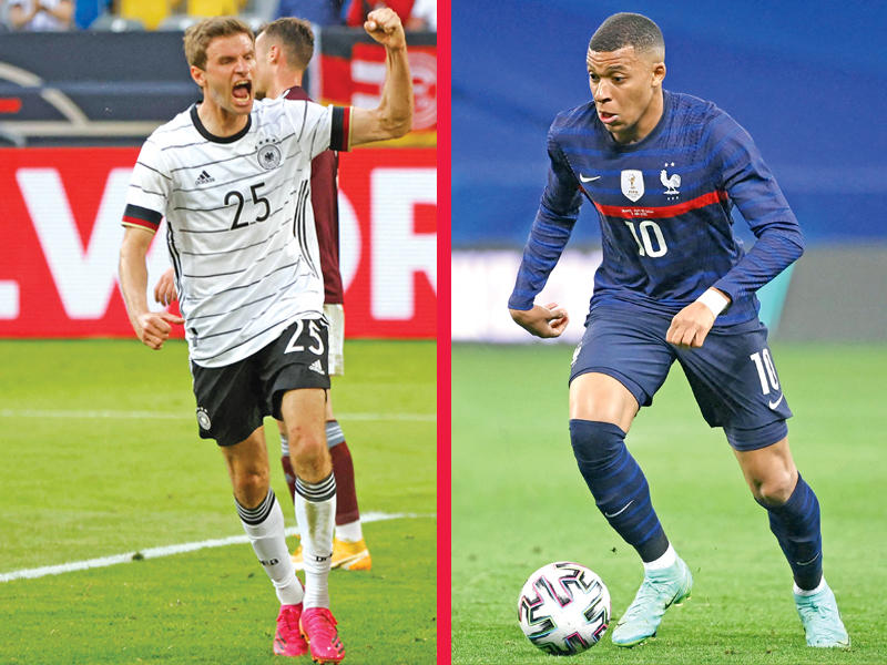 لاعب منتخب فرنسا كيليان مبابي - لاعب المنتخب الألماني  توماس مولر