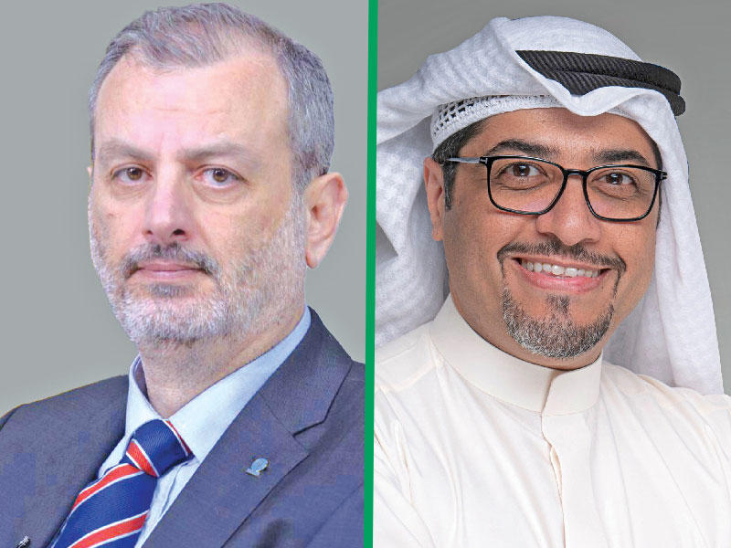 رئيس إدارة التسويق والاتصال المؤسسي في البورصة ناصر السنعوسي - ممثل مكتب المفوضية لدى الكويت د. سامر حدادين 