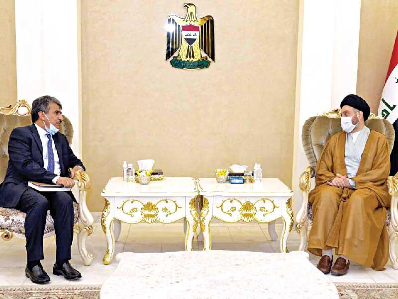 السيد عمار الحكيم وسفير الكويت لدى العراق، سالم الزمانان  خلال اللقاء