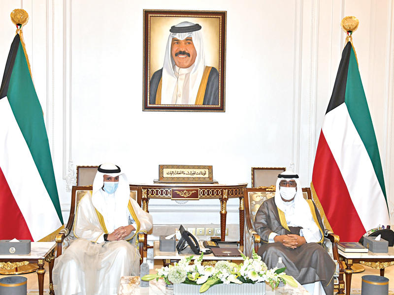 سمو نائب الأمير وولي العهد الشيخ مشعل الأحمد مستقبلاً رئيس مجلس الأمة مرزوق الغانم أمس