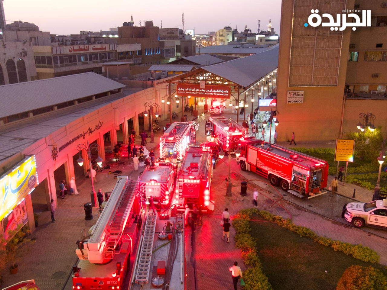 فرق الإطفاء تسيطر على حريق اندلع في ستة محلات تجارية بسوق المباركيةn