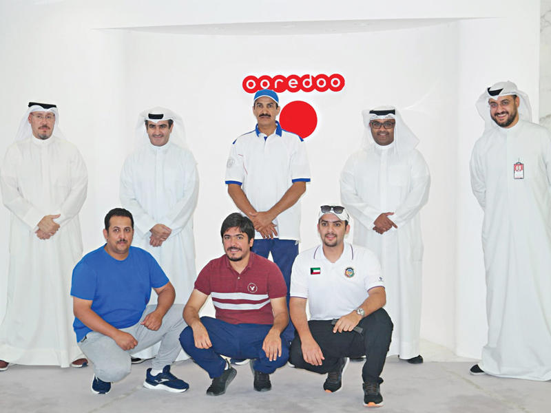 صورة جماعية للرماة مع ممثلي «أوريدو»