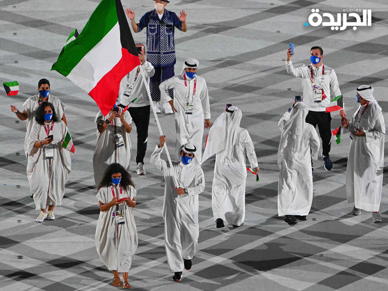 ‏لحظة دخول البعثة الكويتية إلى الملعب الأولمبي