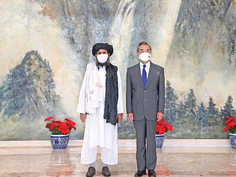 وزير الخارجية الصيني مع بارادار في تيانجين (ا ف ب)