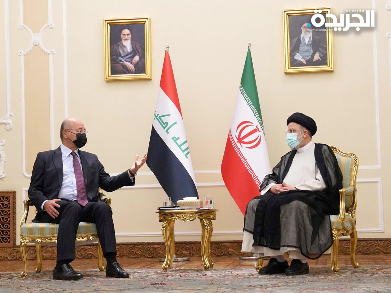 الرئيس الإيراني مستقبلاً برهم صالح