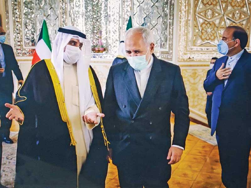 ممثل الأمير الشيخ أحمد الناصر وفي استقباله محمد جواد ظريف أمسn