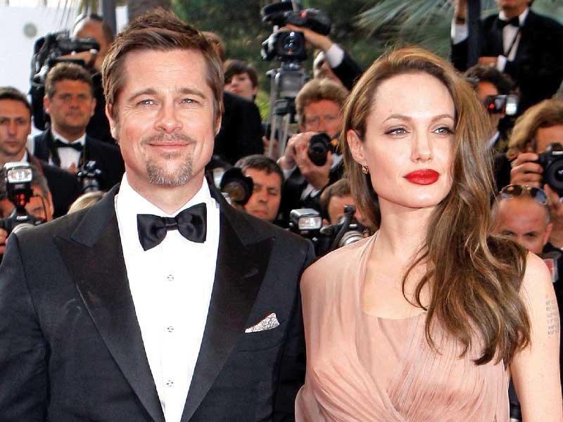 النجم براد بيتوز زوجته السابقة أنجلينا جولي