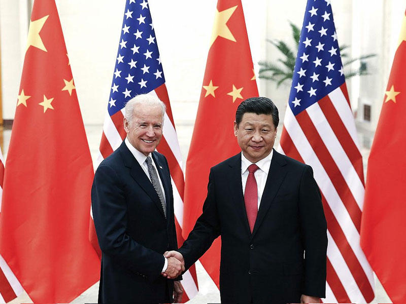 من لقاء سابق بين الرئيس الأميركي جو بايدن والرئيس الصيني شي جين بينغ أرشيفية