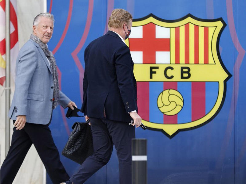 روب يانسن والمدرب الهولندي رونالدو كومان