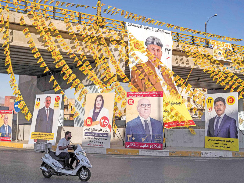 صور لمرشّحين أكراد الى الانتخابات البرلمانية في مدينة زاخو شمال العراق (اي بي آي)