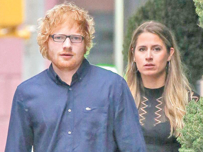 نجم البوب البريطاني الشهير إد شيران وزوجته