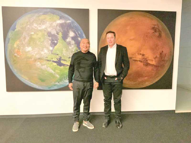 ليو كوغوان مع إيلون ماسك