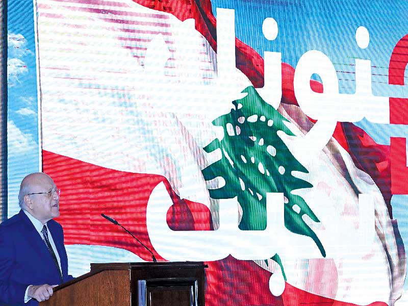 ميقاتي خلال كلمة في السراي أمس (رويترز)