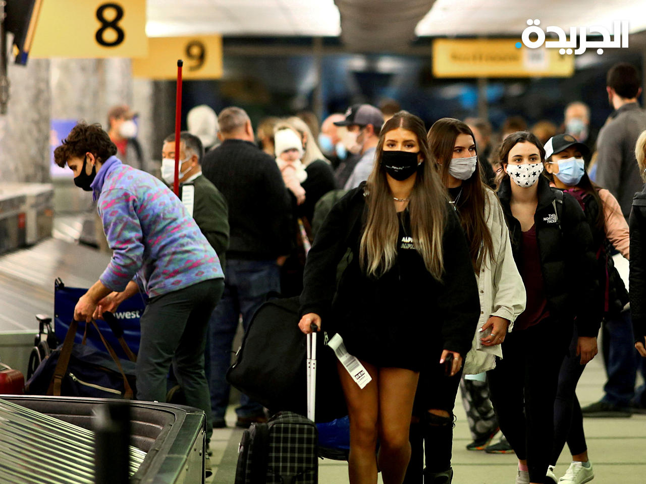 مسافرون في مطار دنفر، كولورادو بالولايات المتحدة