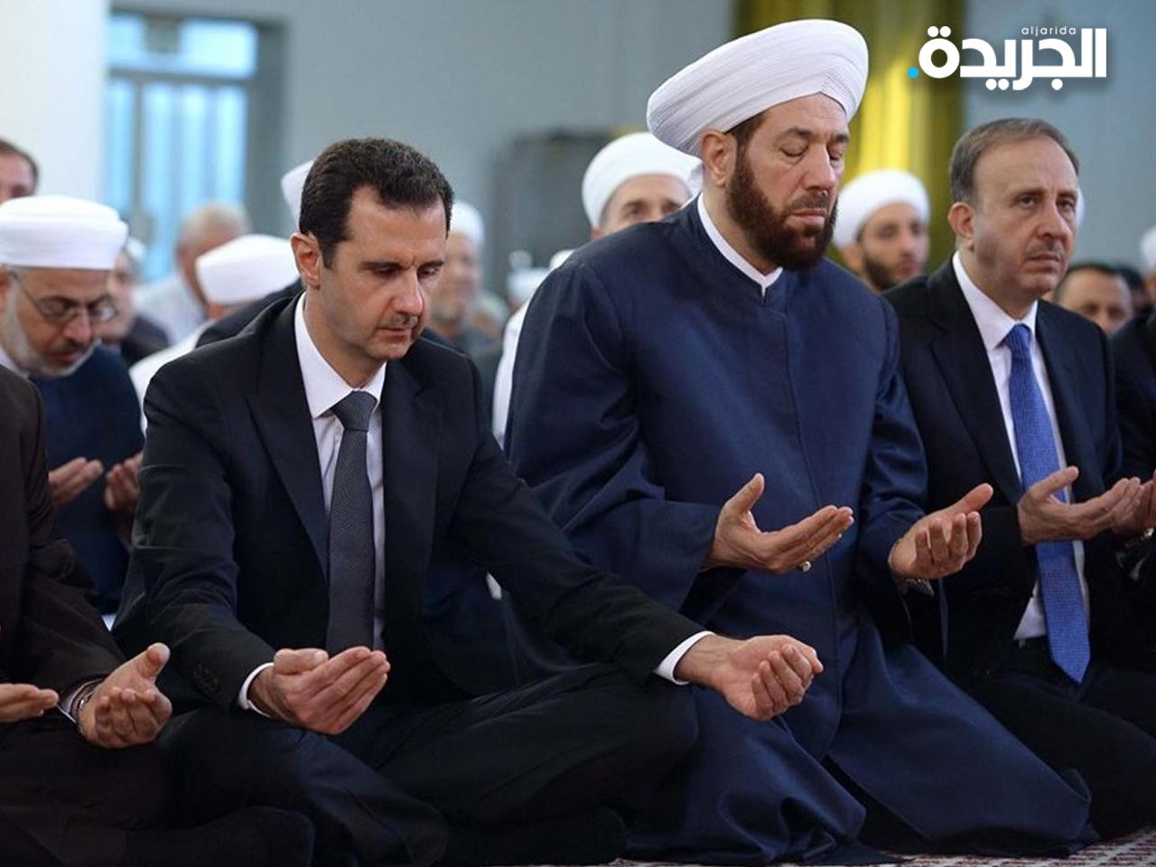 بشار الأسد وحسون في مناسبة سابقة 