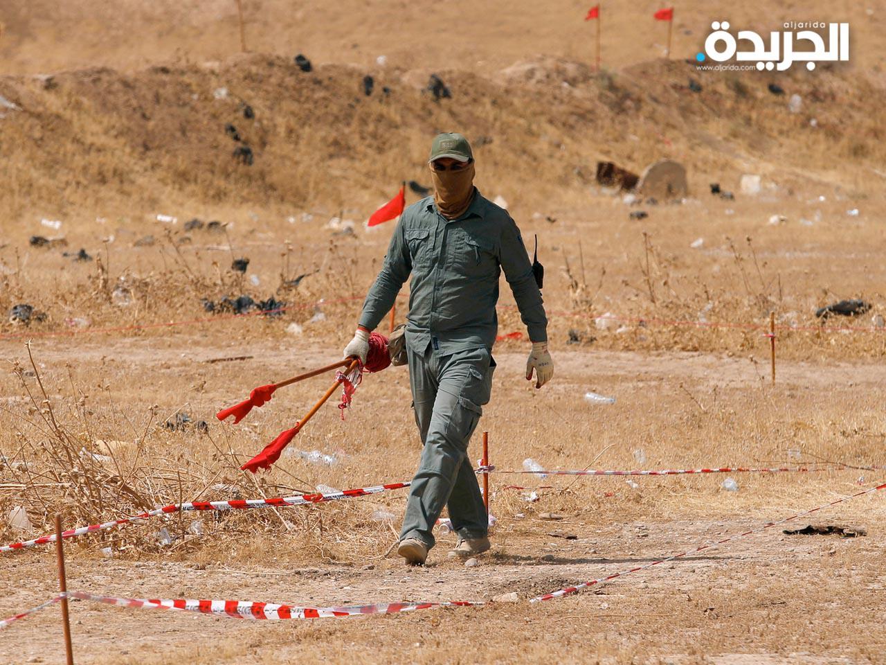 صورة أرشيفية لإحدى عمليات البحث عن الرفات جنوبي العراق