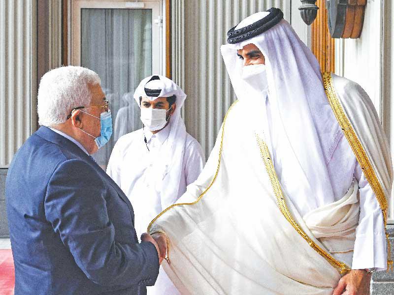أمير قطر الشيخ تميم بن حمد في الدوحة و الرئيس الفلسطيني محمود عباس
