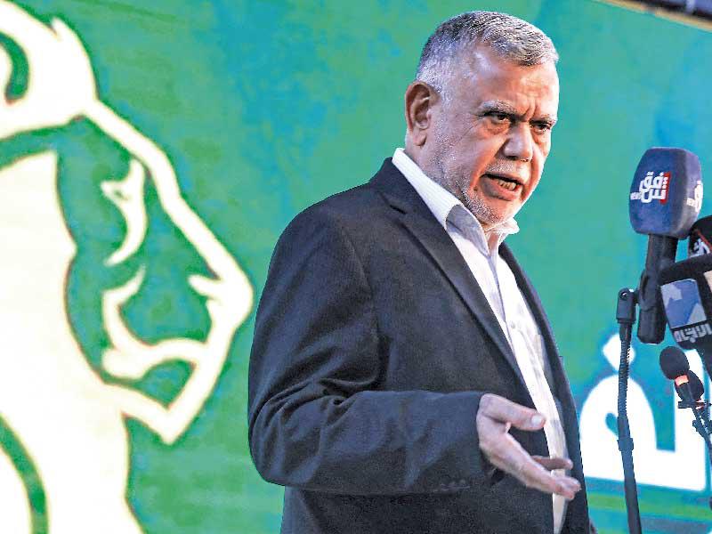 العامري متحدّثاً خلال مؤتمره الصحافي أمس الأول في بغداد (أ ف ب)