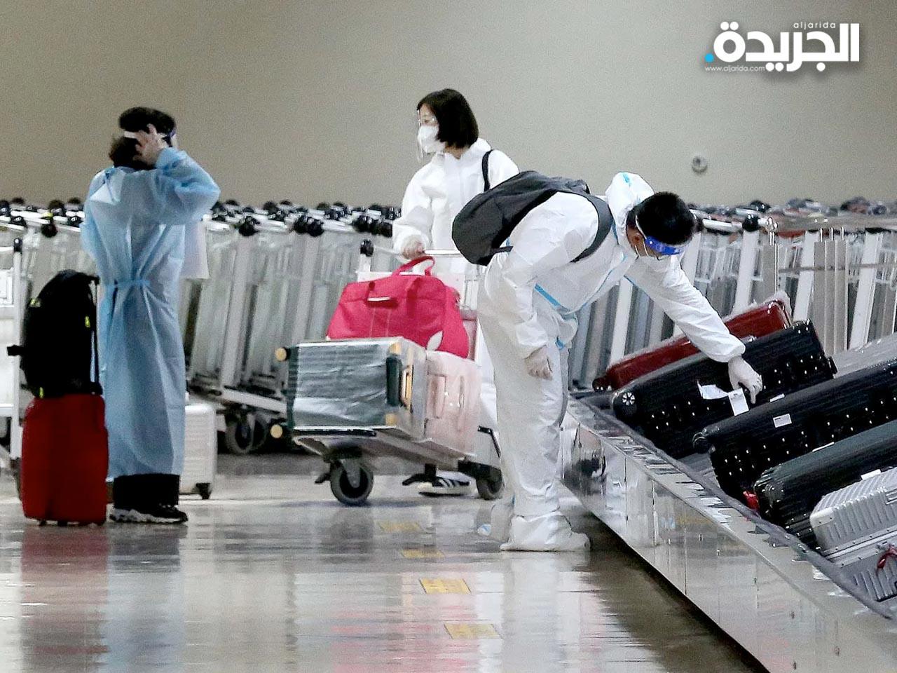 مسافرون يصلون إلى مطار نينوي أكوينو الدولي بالفلبين