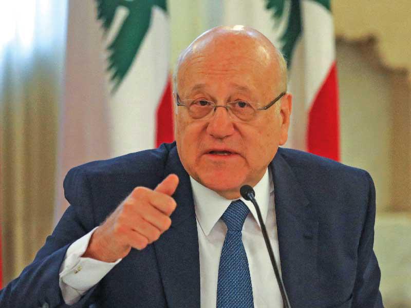 رئيس الوزراء اللبناني نجيب ميقاتي خلال مؤتمره الصحافي امس (رويترز)