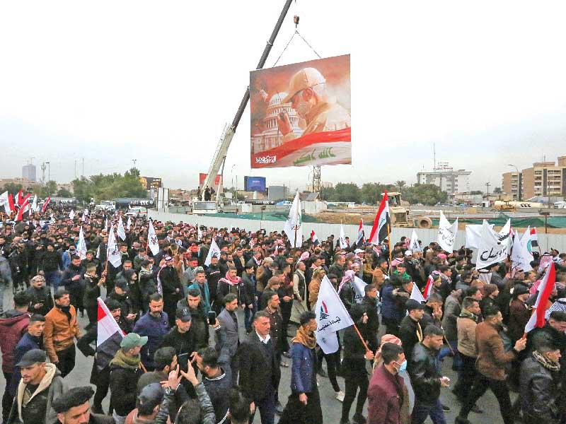 مسيرة للحشد الشعبي في بغداد أمس الأول      (أ ف ب)