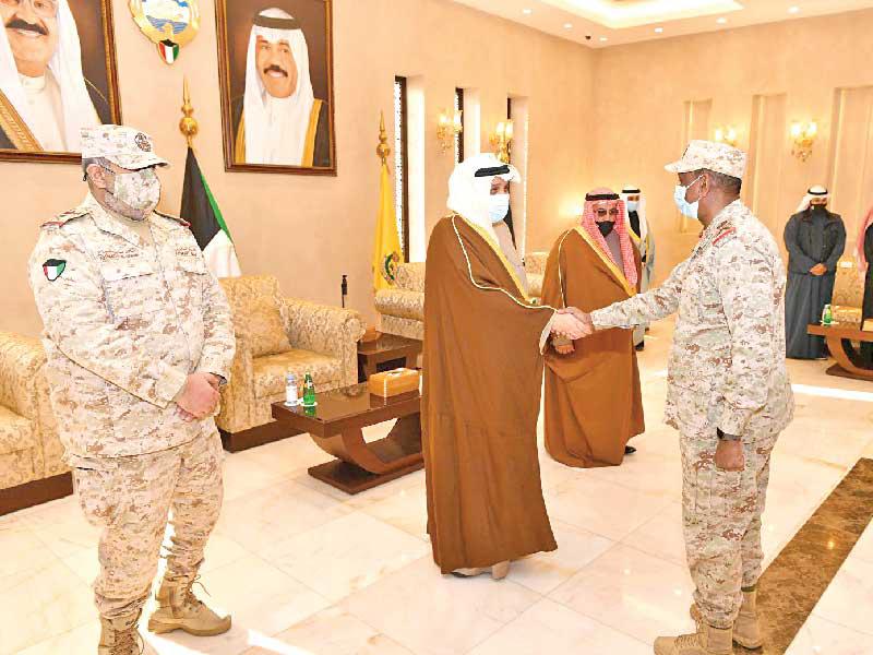 نائب رئيس مجلس الوزراء وزير الدفاع الشيخ حمد الجابر مستقبلاً المهنئين أمس