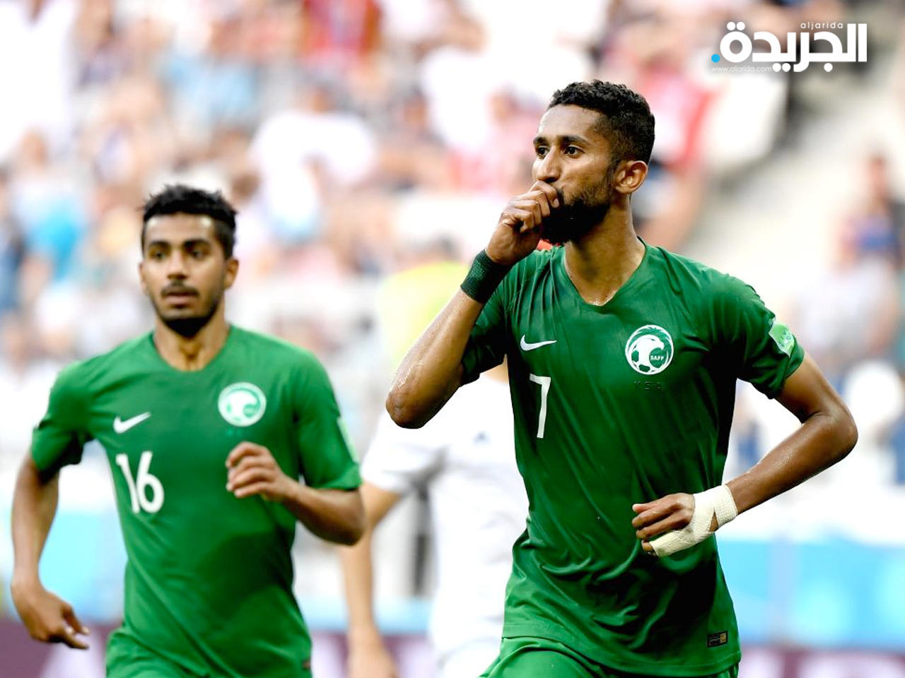 الفرج محتفلاً بأحد أهدافه مع الأخضر السعودي