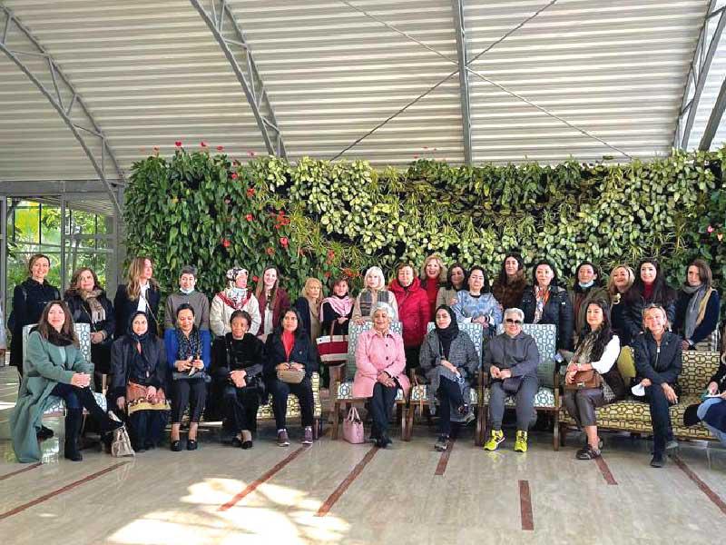 وفد «المرأة الدولية» خلال الزيارة