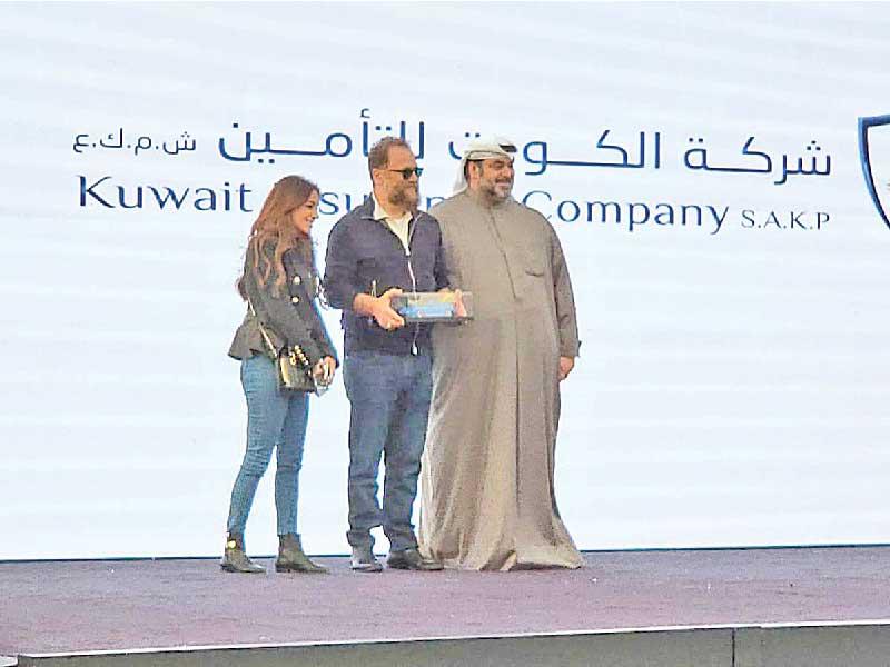 مشاركة «الكويت للتأمين» في مهرجان نادي بورشه