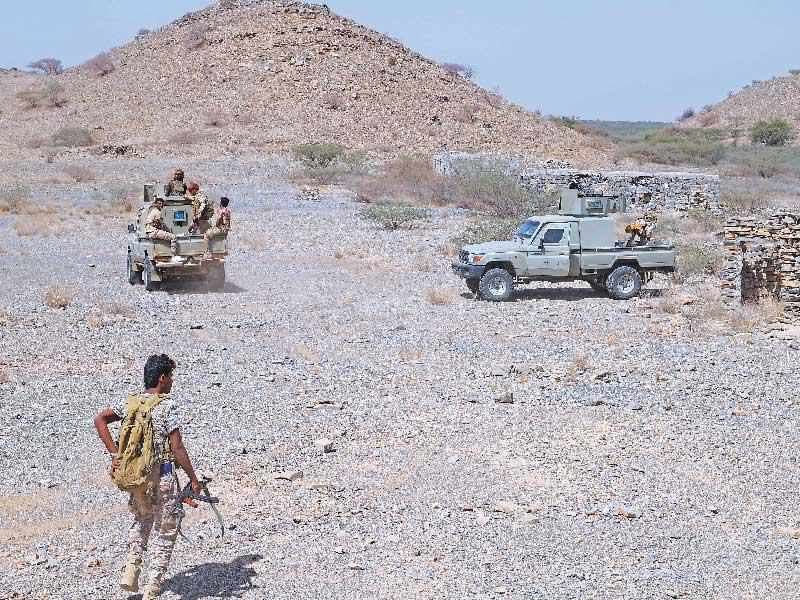 قوات مناهضة للحوثيين في منطقة حرض قرب الحدود مع السعودية (أ ف ب)
