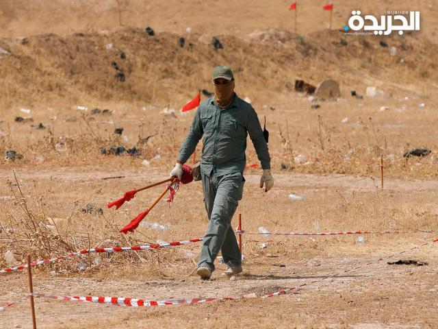 صورة أرشيفية لإحدى عمليات البحث عن الرفات جنوبي العراق