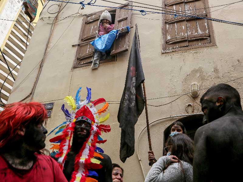 جانب من مهرجان زامبو التقليدي في مدينة طرابلس (د ب أ)n