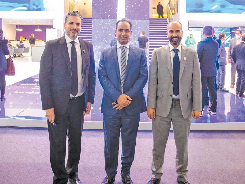  الحربي وعطوي والهملان خلال مشاركتهم  في «MWC 2022»