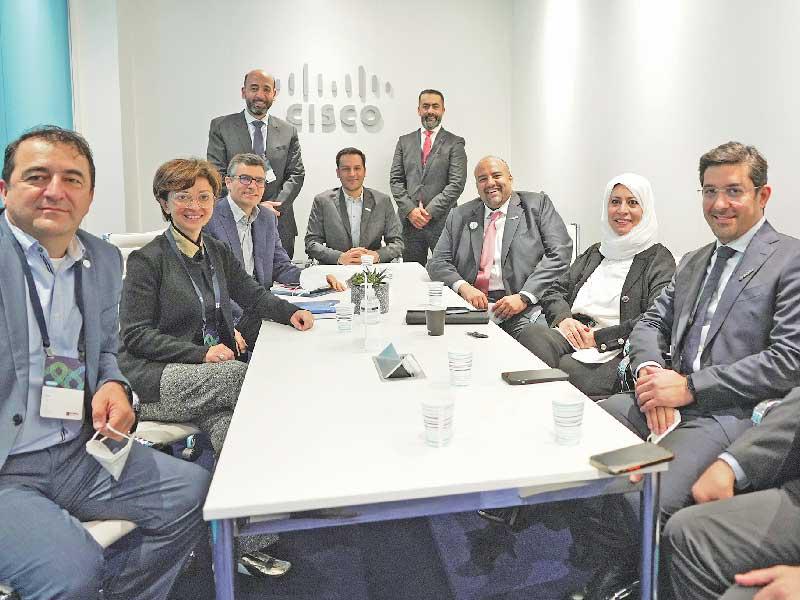 الروضان والمسؤولون التنفيذيون من زين وCisco في برشلونة 