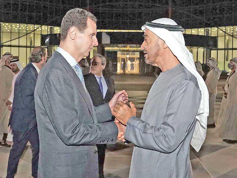 بن زايد وألأسد في أبوظبي امس الاول (أ ف ب)