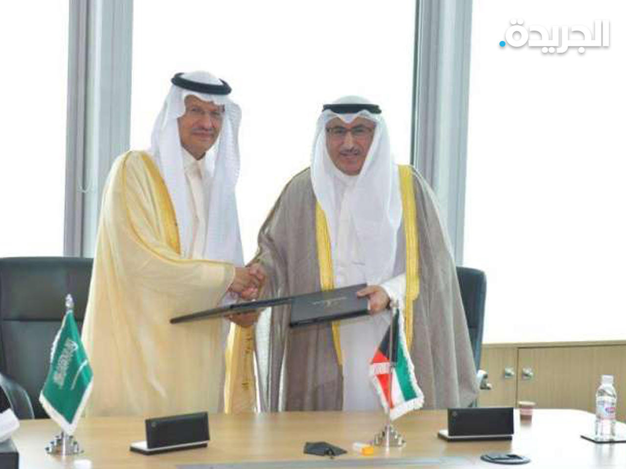 محمد الفارس ووزير الطاقة السعودي عقب التوقيع