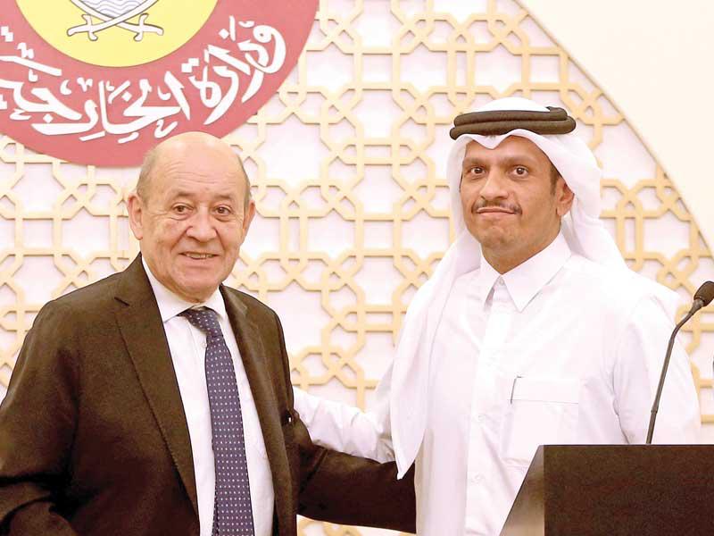نائب رئيس الوزراء وزير الخارجية القطري الشيخ محمد بن عبدالرحمن ووزير الخارجية الفرنسي جان إيف لودريان