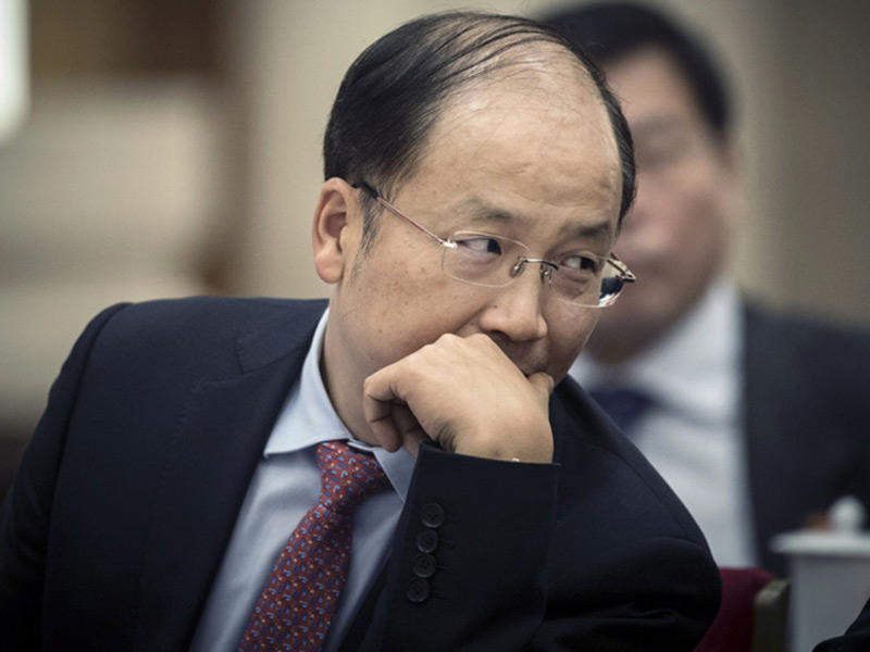  رئيس لجنة تنظيم الأوراق المالية الصينية، يي هويمان