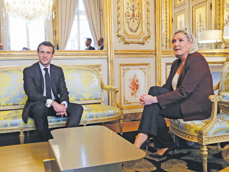 ماكرون ولوبن في الإليزيه في عام 2019n